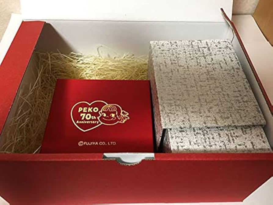 Amazon.co.jp: ペコちゃん70周年記念 純金フィギュア : おもちゃ